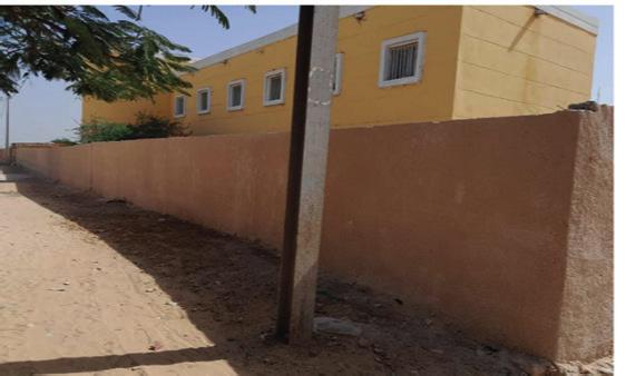 Mur de clôture rénové de l'école de Ndiourbel